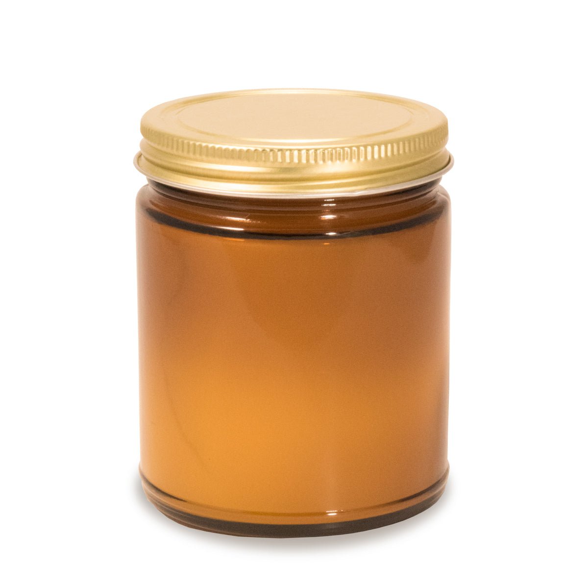 8 oz amber glass apothecary jar candle with gold screw-on lid.