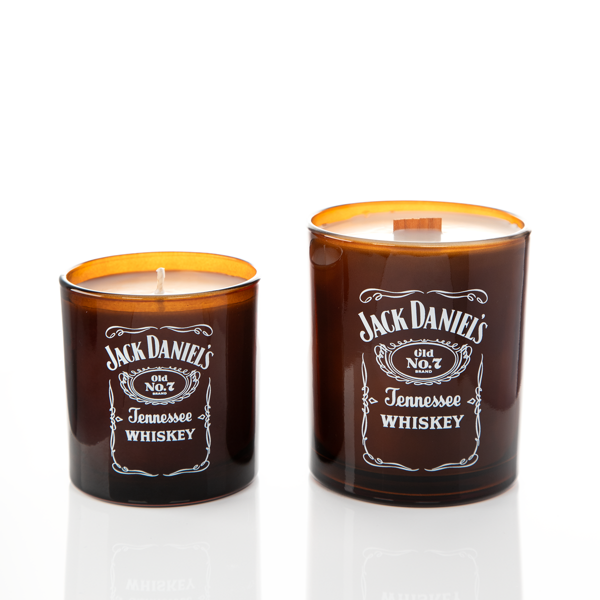 Amber glass candles, 9 oz. beside 14 oz., both custom printed with the same logo, from Bath Promotions