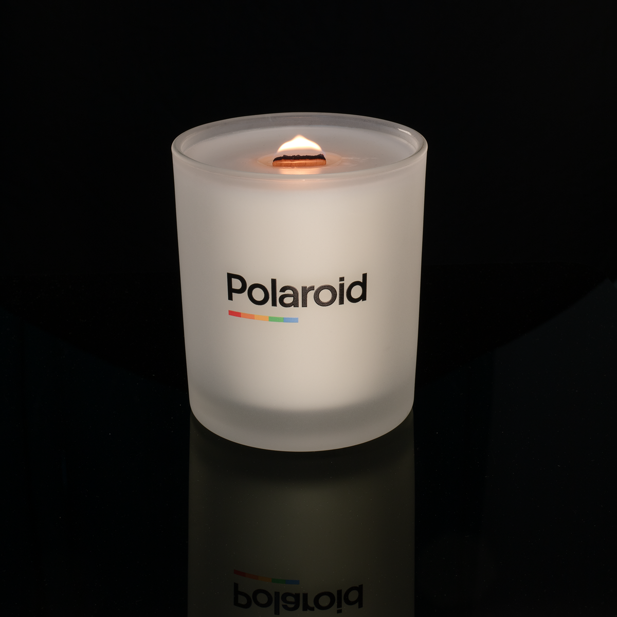 14 oz. Frosted glass candle with custom printed logo from Bath Promotions, shown lit — Lit version