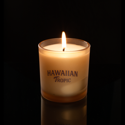 9 oz. Sand glass candle with custom printed logo from Bath Promotions, shown lit — Lit version