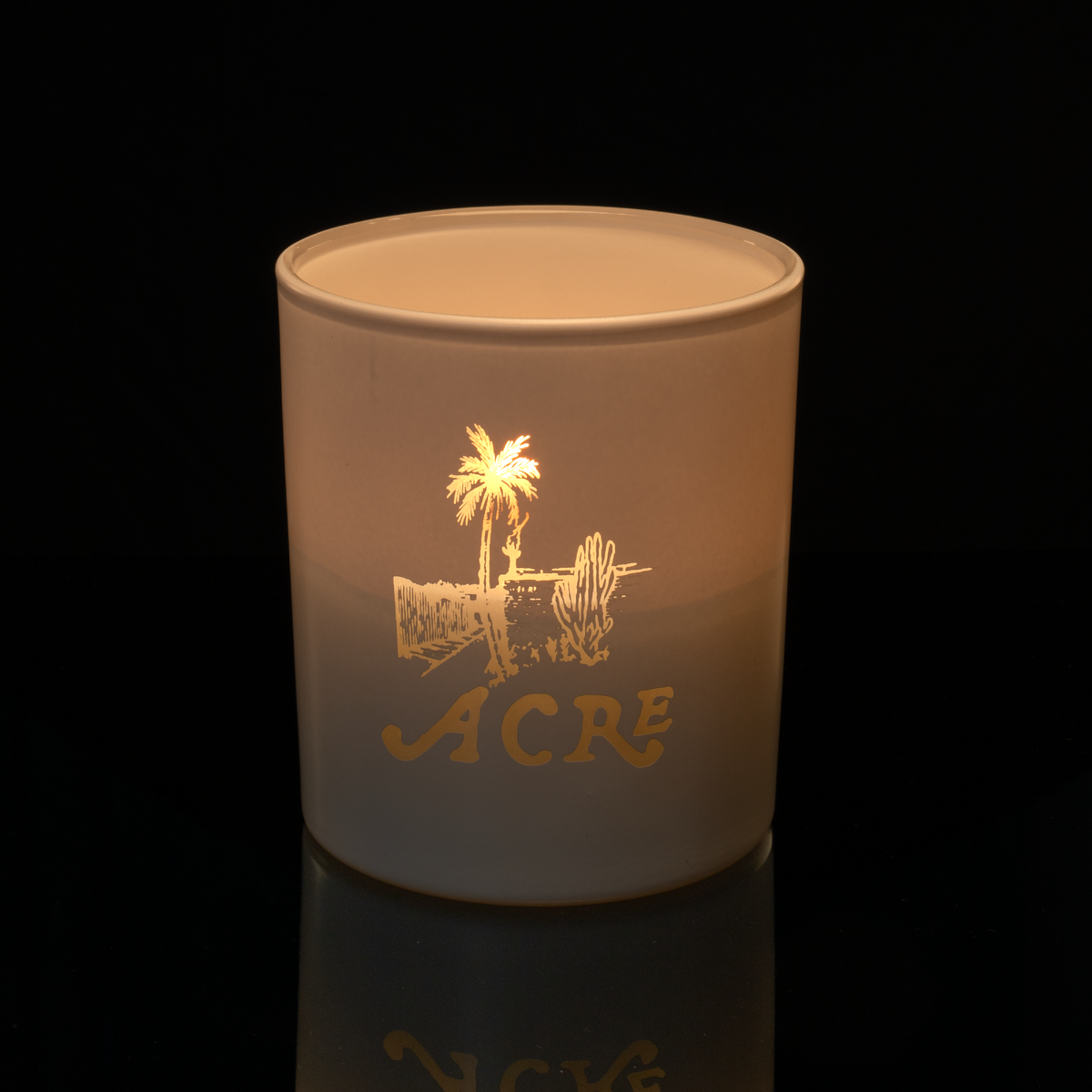 14 oz. White glass candle with custom engraved logo from Bath Promotions, shown lit — Lit version