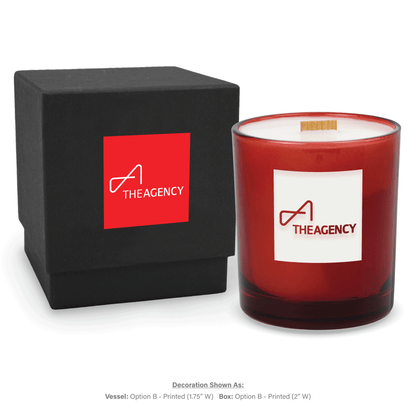 14 oz. Red glass candle with custom engraved logo next to its matching Black gift box
