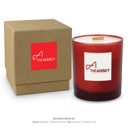 14 oz. Red glass candle with custom engraved logo next to its matching Kraft gift box