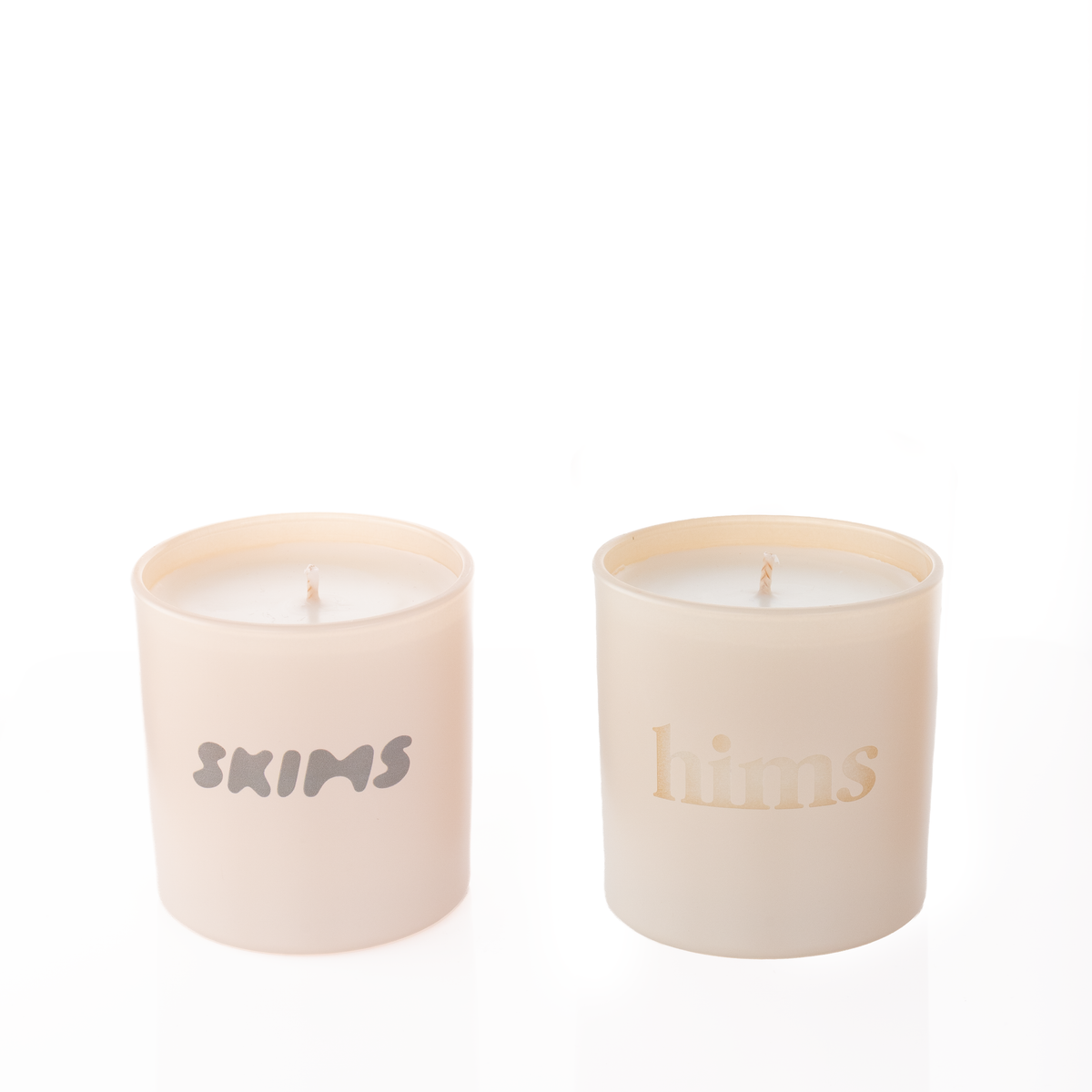 Nude glass, two 9 oz. candles side by side, one custom printed and one laser engraved, from Bath Promotions