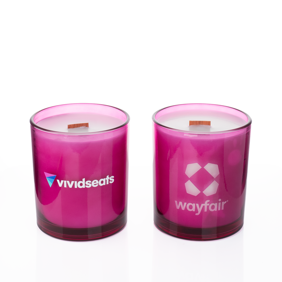 Purple glass, two 14 oz. candles side by side, one custom printed and one laser engraved, from Bath Promotions