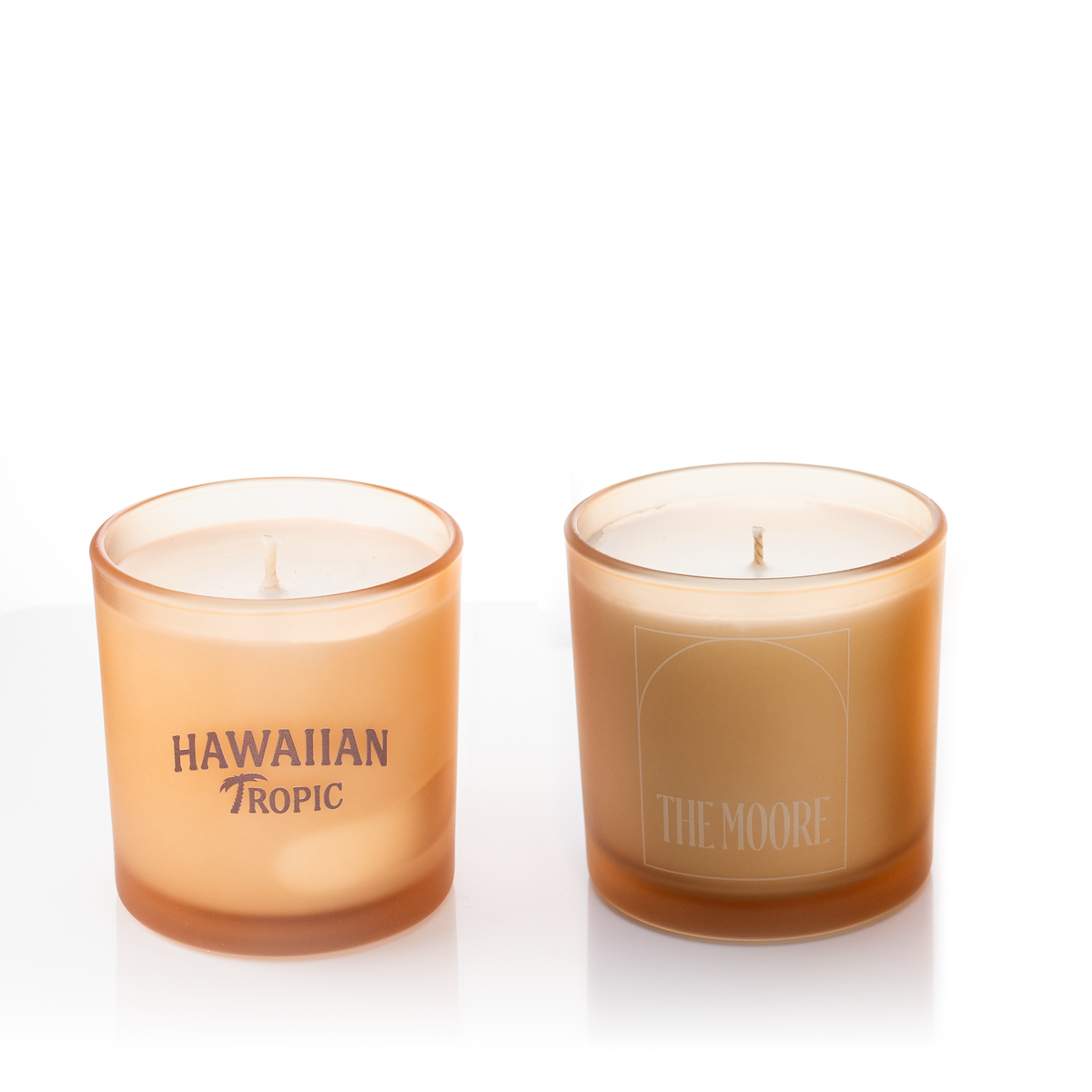 Sand glass, two 9 oz. candles side by side, one custom printed and one laser engraved, from Bath Promotions