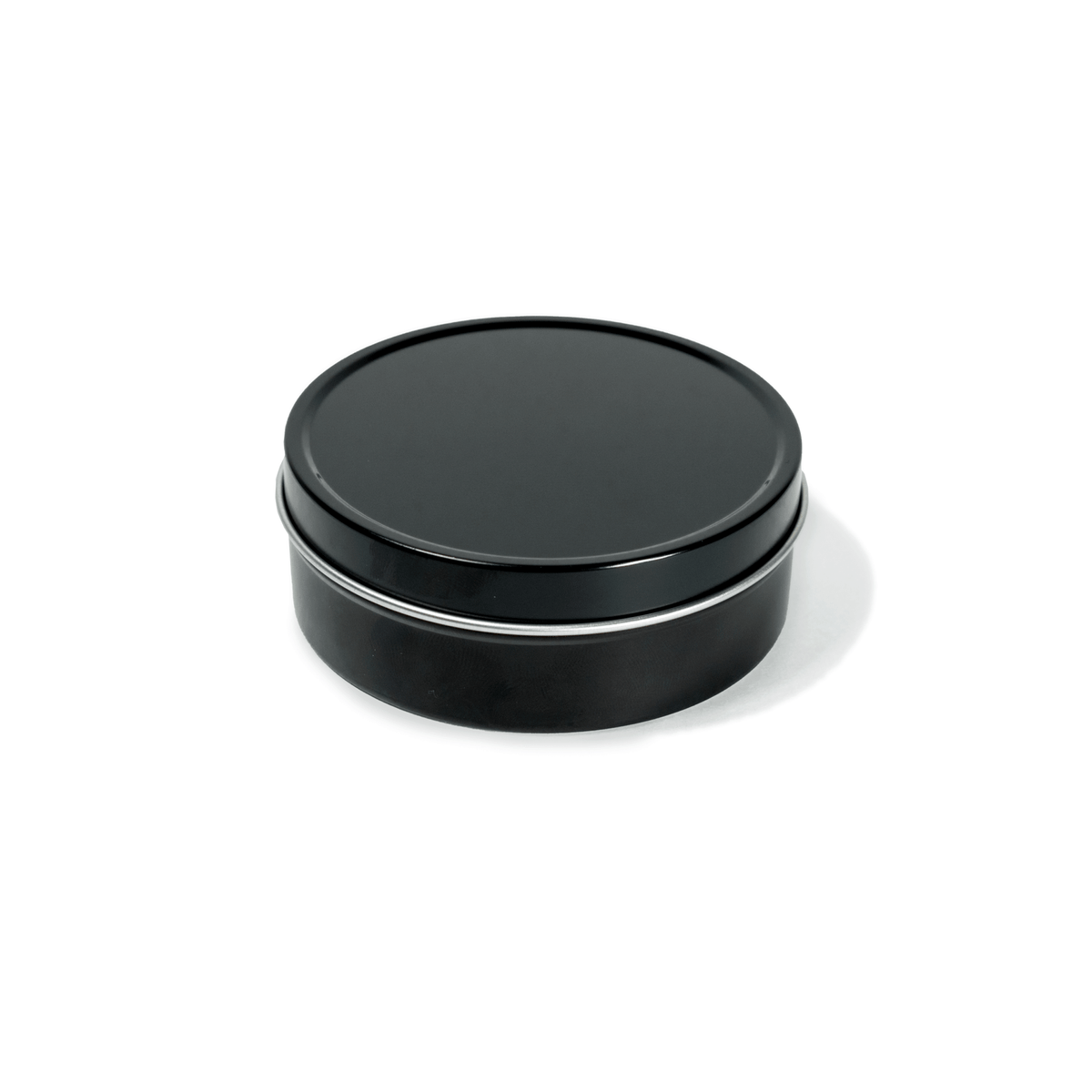 4 oz black tin travel candle shown with removable black lid.