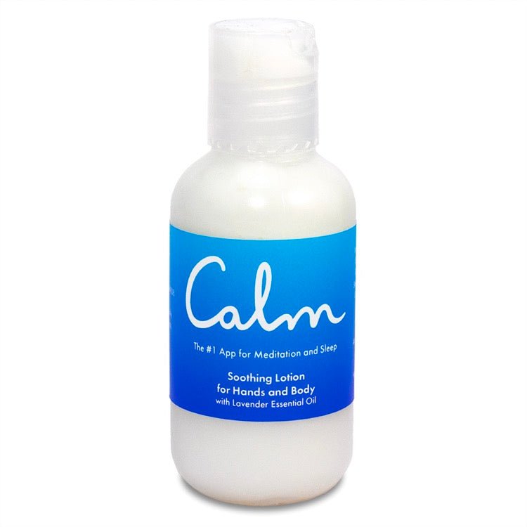 White plastic bottle with clear flip-top cap containing white lotion, featuring blue label with white text. The label indicates this is 'Soothing Lotion for Hands & Body with lavender Essential Oil.