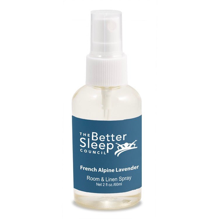 2 oz clear spray bottle with white pump top and blue label.