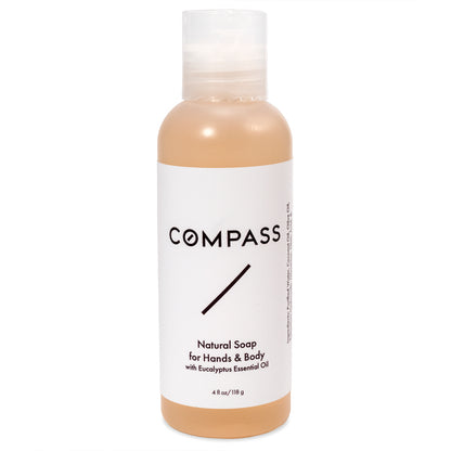 Plastic bottle with clear flip-top cap containing shower gel, featuring a minimalist white label with black text. The label indicates this is 'Natural soap  with Eucalyptus Essential Oil' in a 4 fl oz/118 g size.