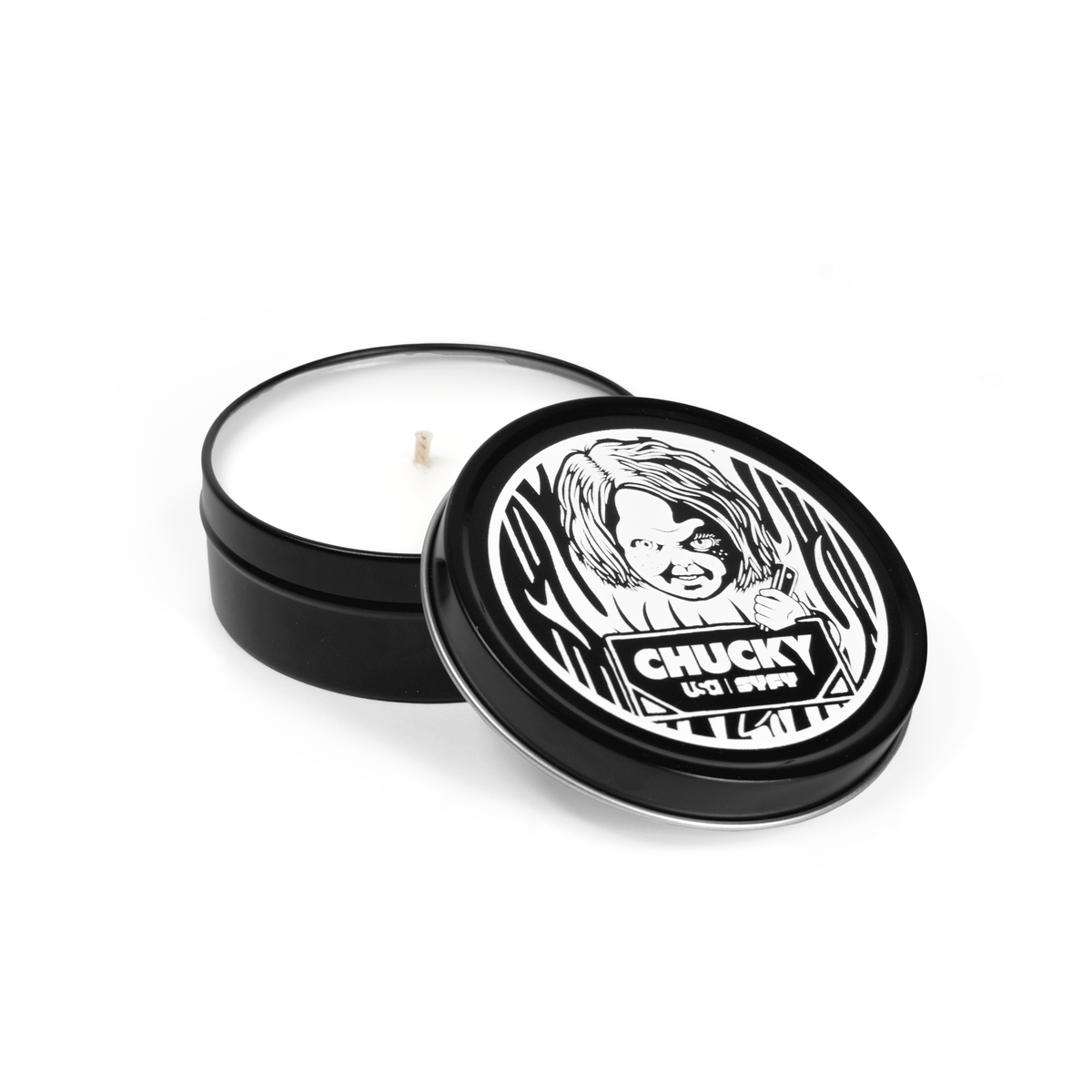 4 oz black tin travel candle with white wax and cotton wick, shown with removable black lid featuring white imagery.
