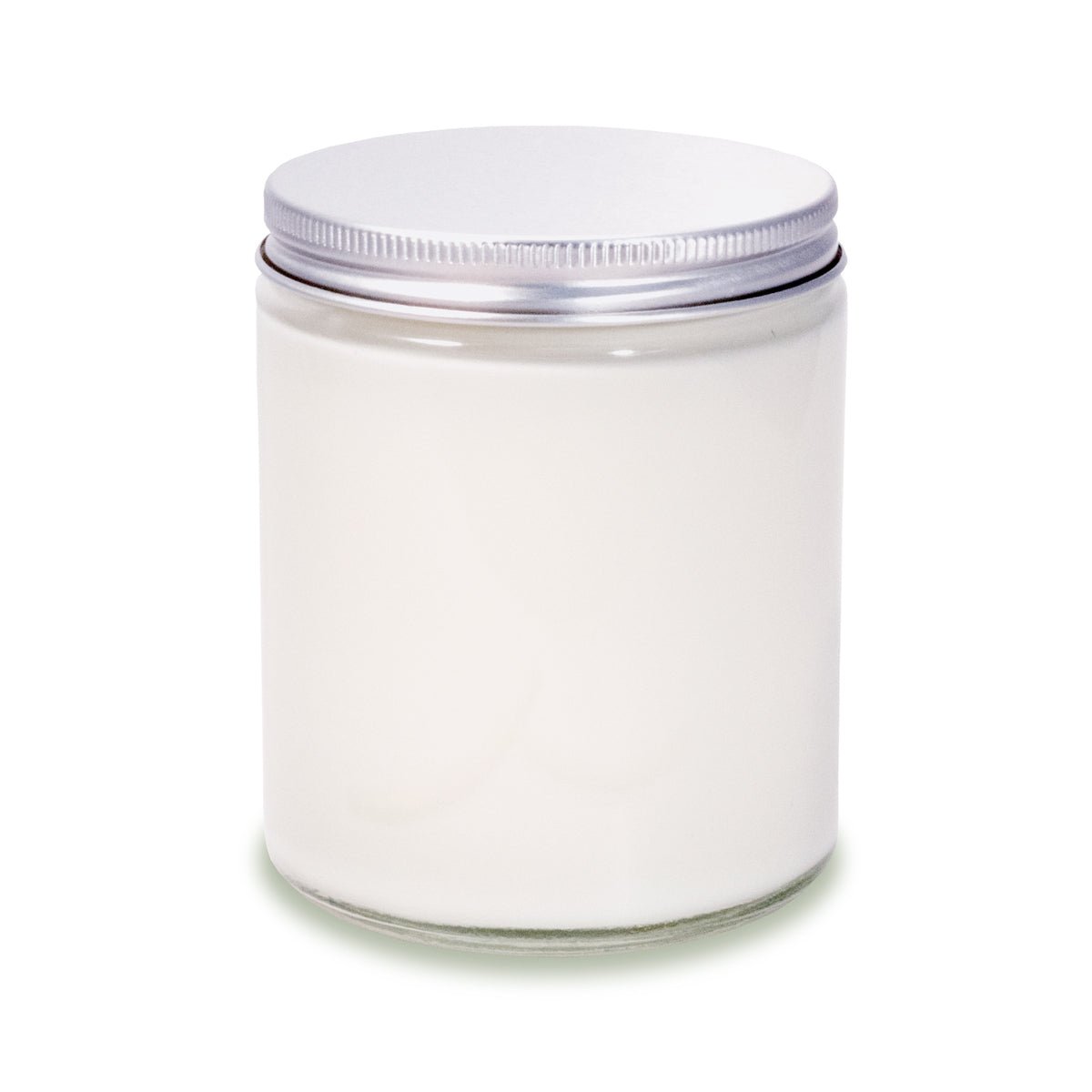 8 oz clear glass apothecary jar candle with silver screw-on lid, showing white wax.
