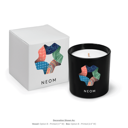 9 oz black glass next to white gift box featuring matching branding